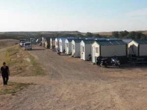 Iron Horse cabins along a ridge overlooking the prairie