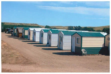 Row of Iron Horse cabins with green roofs