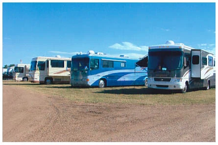 Motorhomes parked in pull-thru RV sites at Iron Horse Campground